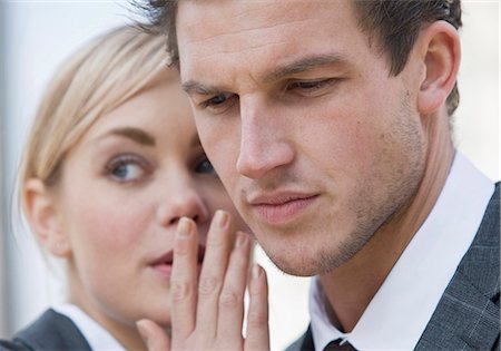 Businesswoman whispering to businessman Photographie de stock - Premium Libres de Droits, Code: 628-07072511