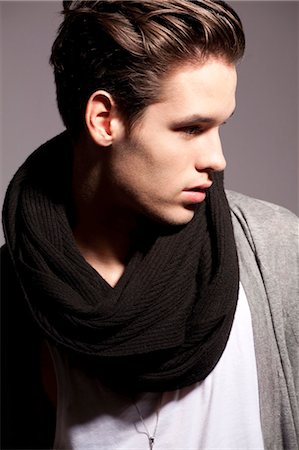 fashion of black people - Young man wearing woolen scarf Stock Photo - Premium Royalty-Free, Code: 628-07072578