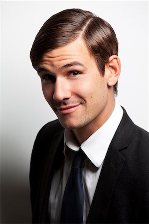 styles of portrait - Young brunette man in suit Photographie de stock - Premium Libres de Droits, Code: 628-07072570