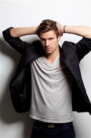 Brunette young man wearing sports jacket and shirt Photographie de stock - Premium Libres de Droits, Code: 628-07072573