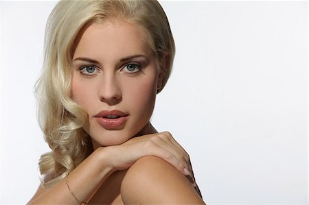 serious face - Attractive blond young woman, portrait Stock Photo - Premium Royalty-Free, Code: 628-07072770