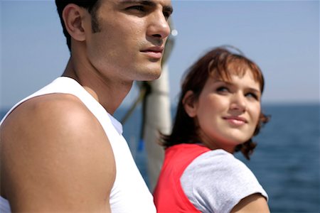 friends sailing - Couple on a sailboat Stock Photo - Premium Royalty-Free, Code: 628-00919930
