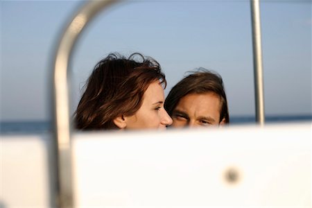 friends sailing - Couple on a sailboat Stock Photo - Premium Royalty-Free, Code: 628-00919955
