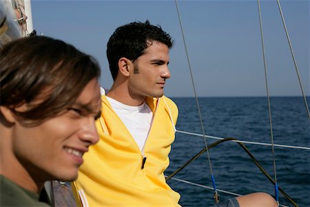 friends sailing - Two men on a sailboat Stock Photo - Premium Royalty-Free, Code: 628-00919950