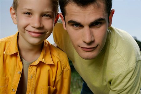 simsearch:628-00919973,k - Father and son looking at camera Stock Photo - Premium Royalty-Free, Code: 628-00919966