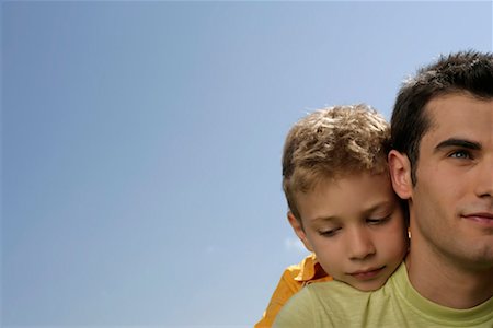 simsearch:628-00919973,k - Son putting his head on his father's shoulder Stock Photo - Premium Royalty-Free, Code: 628-00919980