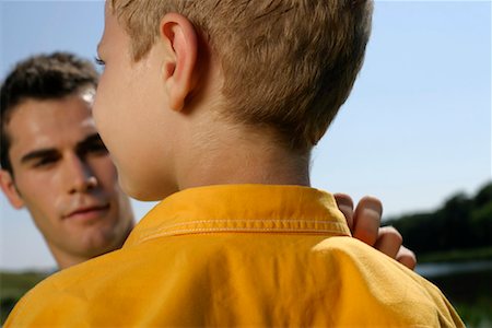 short boy kids - Father and son standing vis-à- vis Stock Photo - Premium Royalty-Free, Code: 628-00920003