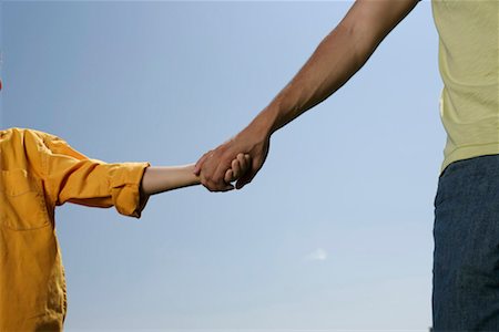 simsearch:628-00920051,k - Father and son holding hands Stock Photo - Premium Royalty-Free, Code: 628-00920014
