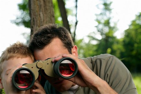simsearch:628-00919973,k - Father and son looking together through binoculars Stock Photo - Premium Royalty-Free, Code: 628-00920020