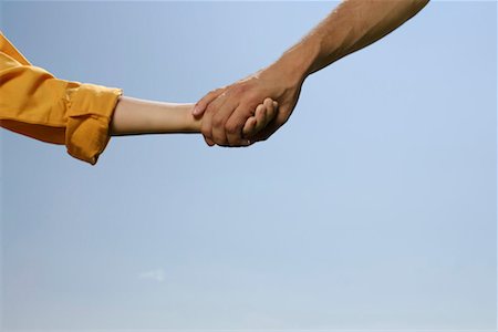 simsearch:628-00919973,k - Father and son holding hands Stock Photo - Premium Royalty-Free, Code: 628-00920036
