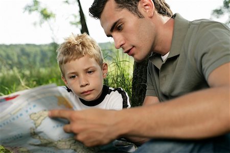 simsearch:628-00920051,k - Father and son looking at a world map Stock Photo - Premium Royalty-Free, Code: 628-00920041