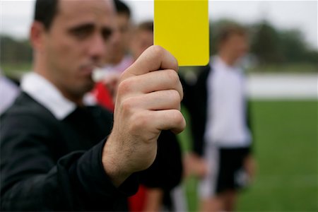 Man holding red card stock photo