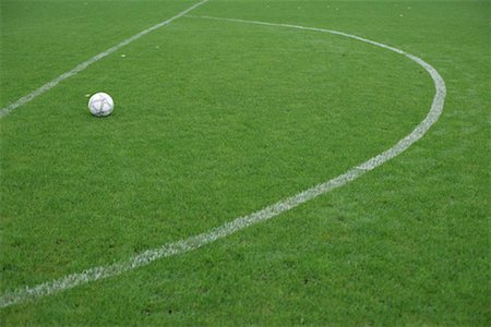 Football lying in a marked area, ready for direct free kick Stock Photo - Premium Royalty-Free, Code: 628-00920107