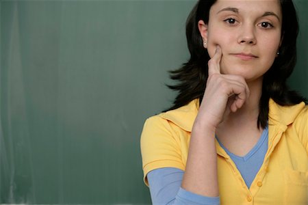 simsearch:628-00920637,k - Portrait of a teenage girl in front of a blackboard Stock Photo - Premium Royalty-Free, Code: 628-00920613