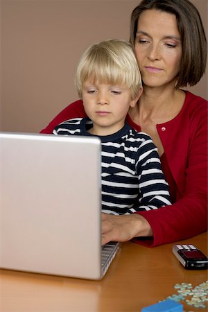 simsearch:628-01279508,k - Mother and son (4-5 Years) using a laptop Stock Photo - Premium Royalty-Free, Code: 628-01278362