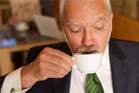 simsearch:628-01278542,k - Mature businessman drinking a cup of coffee Stock Photo - Premium Royalty-Free, Code: 628-01278824