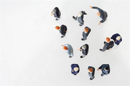 High angle view of a group of businessmen figurines Stock Photo - Premium Royalty-Free, Code: 628-01278850