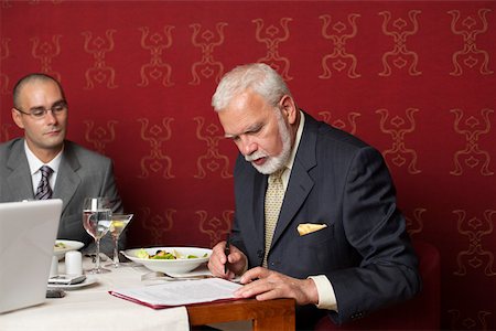 simsearch:628-01278542,k - Two businessmen having a business lunch Stock Photo - Premium Royalty-Free, Code: 628-01279184