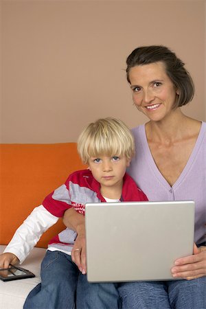 simsearch:628-01279508,k - Mother and son (4-5 Years) using a laptop Stock Photo - Premium Royalty-Free, Code: 628-01279318
