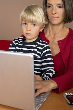 simsearch:628-01279508,k - Mother and son (4-5 Years) using a laptop Stock Photo - Premium Royalty-Free, Code: 628-01279597