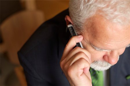 simsearch:628-01278542,k - Mature businessman phoning with a mobile phone Stock Photo - Premium Royalty-Free, Code: 628-01279608