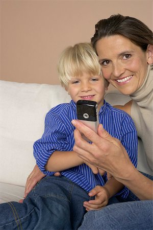 simsearch:628-01279508,k - Mother and son (4-5 Years) looking at a mobile phone Stock Photo - Premium Royalty-Free, Code: 628-01279633