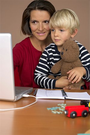 simsearch:628-01279508,k - Mother and son (4-5 Years) using a laptop Stock Photo - Premium Royalty-Free, Code: 628-01279648