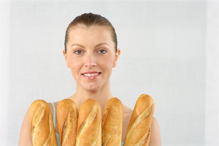 simsearch:628-01495397,k - Milieu adulte femme tenant des baguettes Photographie de stock - Premium Libres de Droits, Code: 628-01494842