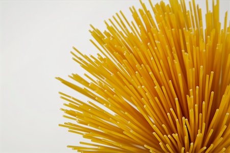 Close-up of raw spaghetti Stock Photo - Premium Royalty-Free, Code: 628-01494973