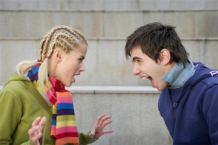 Young couple yelling at each other Stock Photo - Premium Royalty-Free, Code: 628-01495299