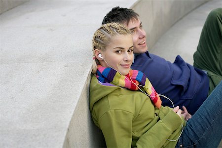 Young couple sitting on staircase Stock Photo - Premium Royalty-Free, Code: 628-01495317