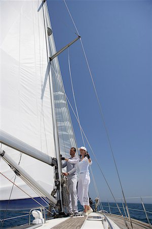 simsearch:628-01495446,k - Two people working on a sailing yacht Stock Photo - Premium Royalty-Free, Code: 628-01495513