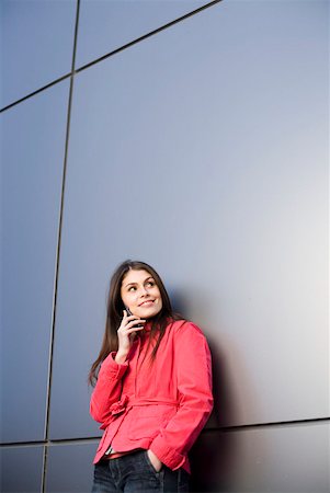 Young woman with a mobile Stock Photo - Premium Royalty-Free, Code: 628-01638899