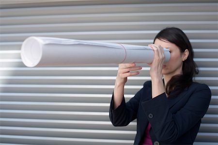 simsearch:628-01639098,k - Businesswoman looking through paper roll Stock Photo - Premium Royalty-Free, Code: 628-01639024