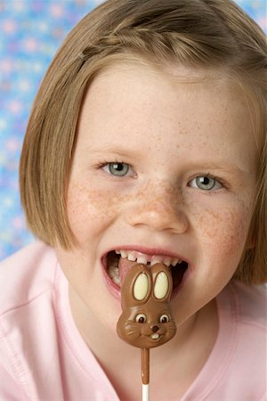 Girl having a Lolly Stock Photo - Premium Royalty-Free, Code: 628-01711939