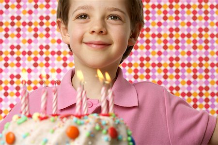 Boy with birthday cake Stock Photo - Premium Royalty-Free, Code: 628-01711965