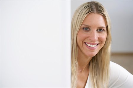 Young woman smiling at camera Stock Photo - Premium Royalty-Free, Code: 628-01712006