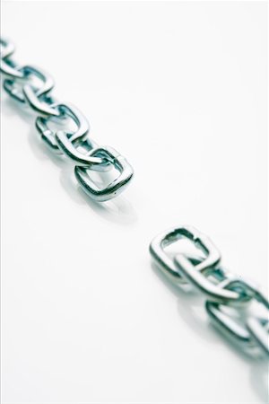 Disconnected chain links Stock Photo - Premium Royalty-Free, Code: 628-01712205