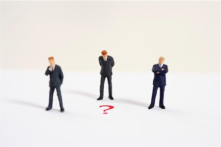 simsearch:628-01712179,k - Three businessmen figurines and question mark Stock Photo - Premium Royalty-Free, Code: 628-01712349