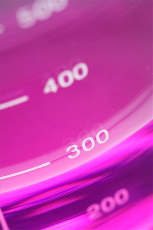Laboratory vessel with pink liquid and measuring scale Stock Photo - Premium Royalty-Free, Code: 628-01836764