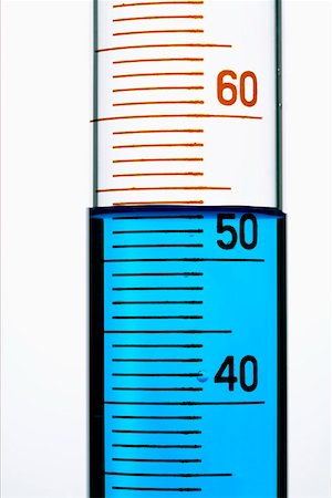 Test tube with measuring scale and blue liquid Stock Photo - Premium Royalty-Free, Code: 628-01836770