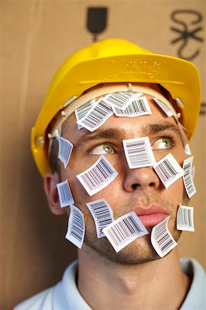 Young man with barcodes in his face Fotografie stock - Premium Royalty-Free, Codice: 628-01877991