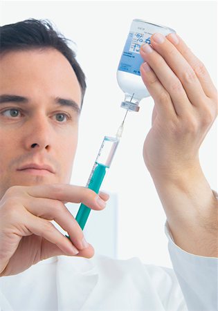 doctor syringe close up - Doctor preparing syringe Stock Photo - Premium Royalty-Free, Code: 628-02062634