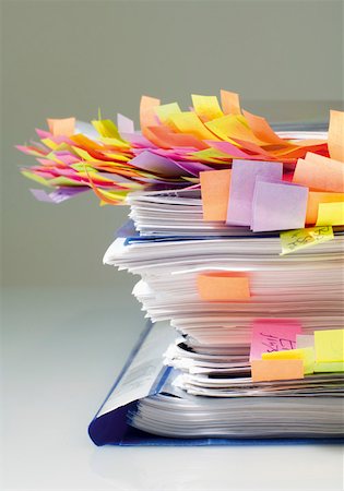 paper chaos in a office - Files with sticky notes marking pages Stock Photo - Premium Royalty-Free, Code: 628-02198032