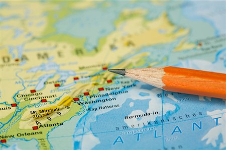 Pencil tip pointing the American east coast on a map Stock Photo - Premium Royalty-Free, Code: 628-02228081