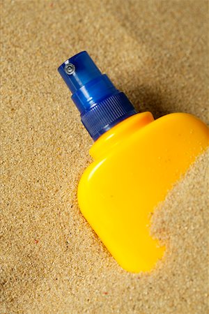 Spray bottle in the sand Stock Photo - Premium Royalty-Free, Code: 628-02228083