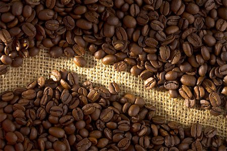 Coffee beans on a gruff cloth Stock Photo - Premium Royalty-Free, Code: 628-02228098