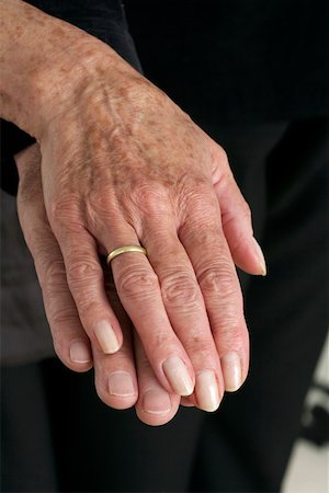 Two hands lying upon each other Stock Photo - Premium Royalty-Free, Code: 628-02228271