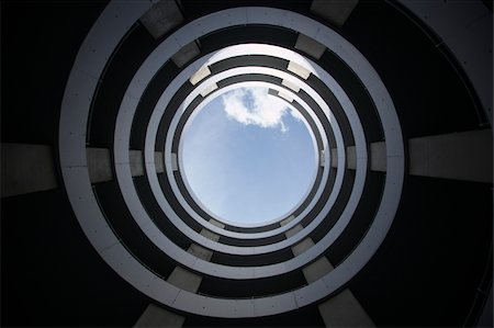 spiral parking garages - Inside a parking garage, low angle view Stock Photo - Premium Royalty-Free, Code: 628-02615576