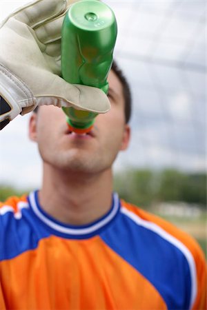 Goalkeeper drinking Stock Photo - Premium Royalty-Free, Code: 628-02954190